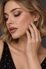 Load image into Gallery viewer, Maylaya Gems White Rhodium 9K Oval Lab-Grown Diamond Solitaire Ring — M053 — AI-generated young adult model in eveningwear / ภาพจำลองนางแบบสวมเครื่องประดับด้วย AI