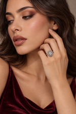 Load image into Gallery viewer, Maylaya Gems White Rhodium 9K Oval 0.56ct Lab-Grown Diamond Halo Ring — M060 — AI-generated young adult model in eveningwear / ภาพจำลองนางแบบสวมเครื่องประดับด้วย AI