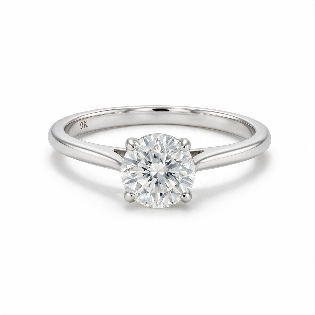 White rhodium 9k round solitairect solitaire ring