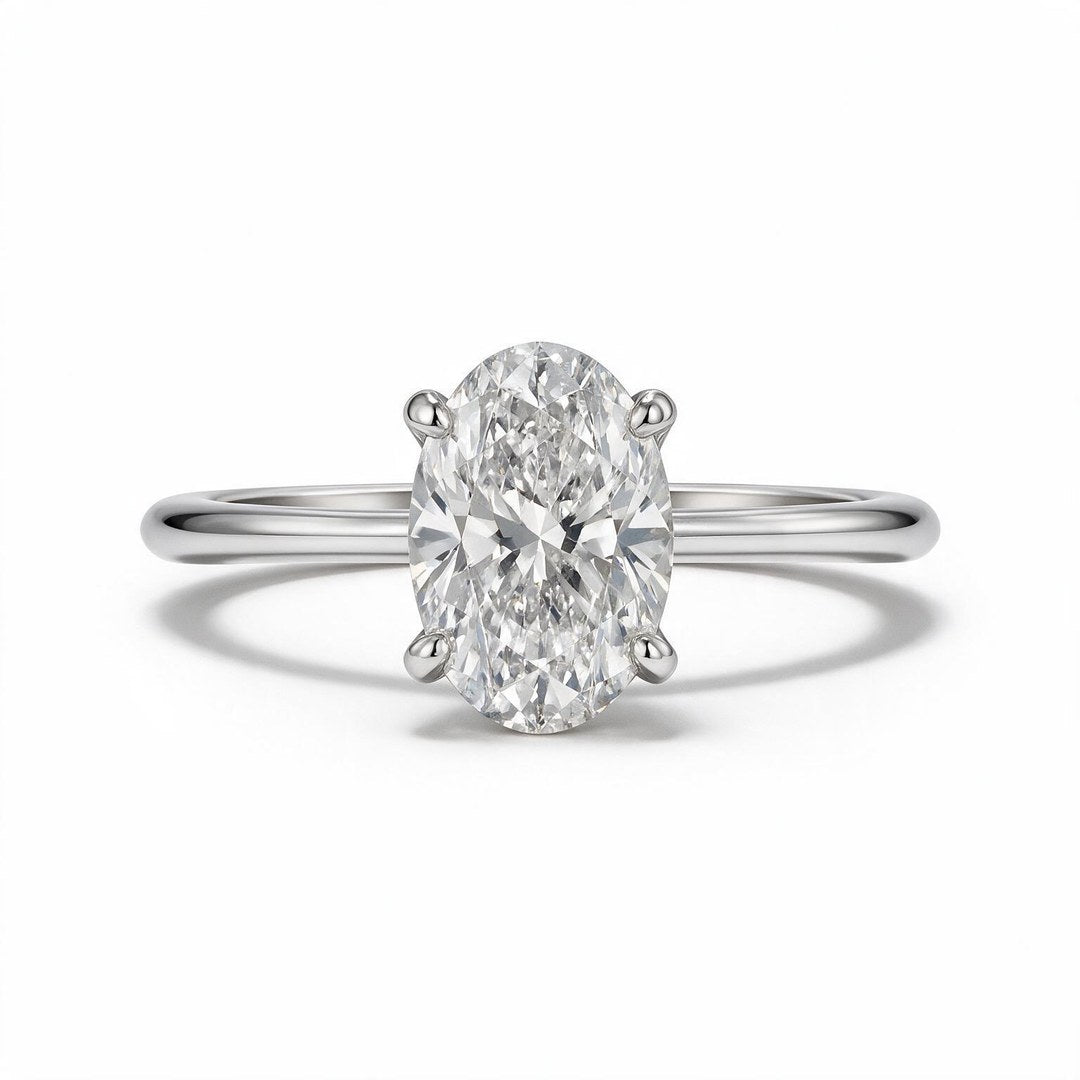 White rhodium 9k oval solitairect solitaire ring