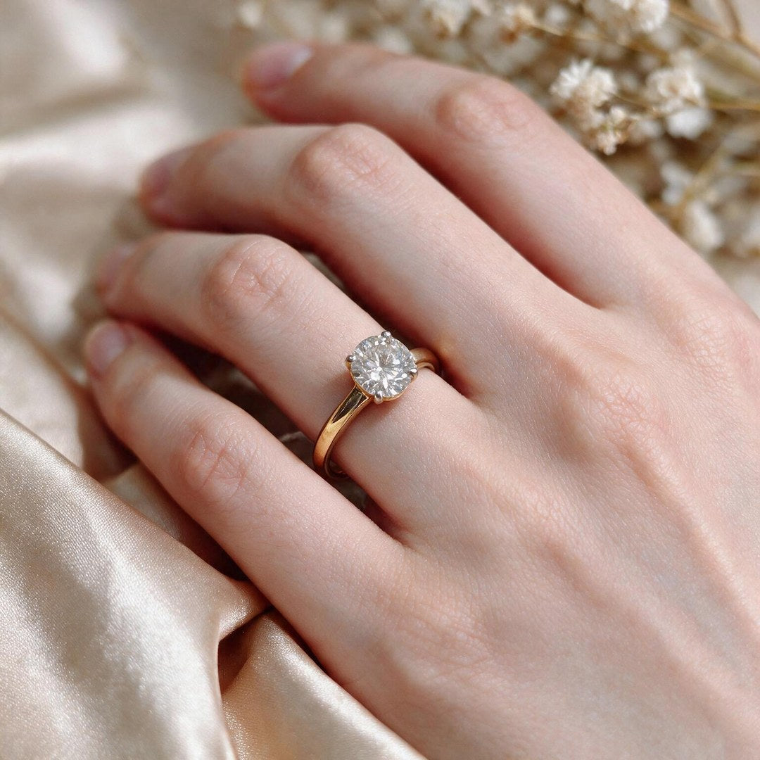 Yellow gold polish 9k round solitairect solitaire ring