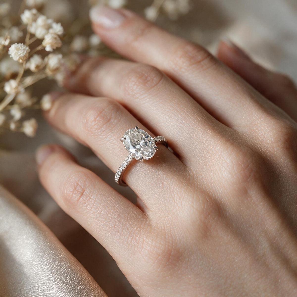 White rhodium 9k oval solitairect solitaire ring