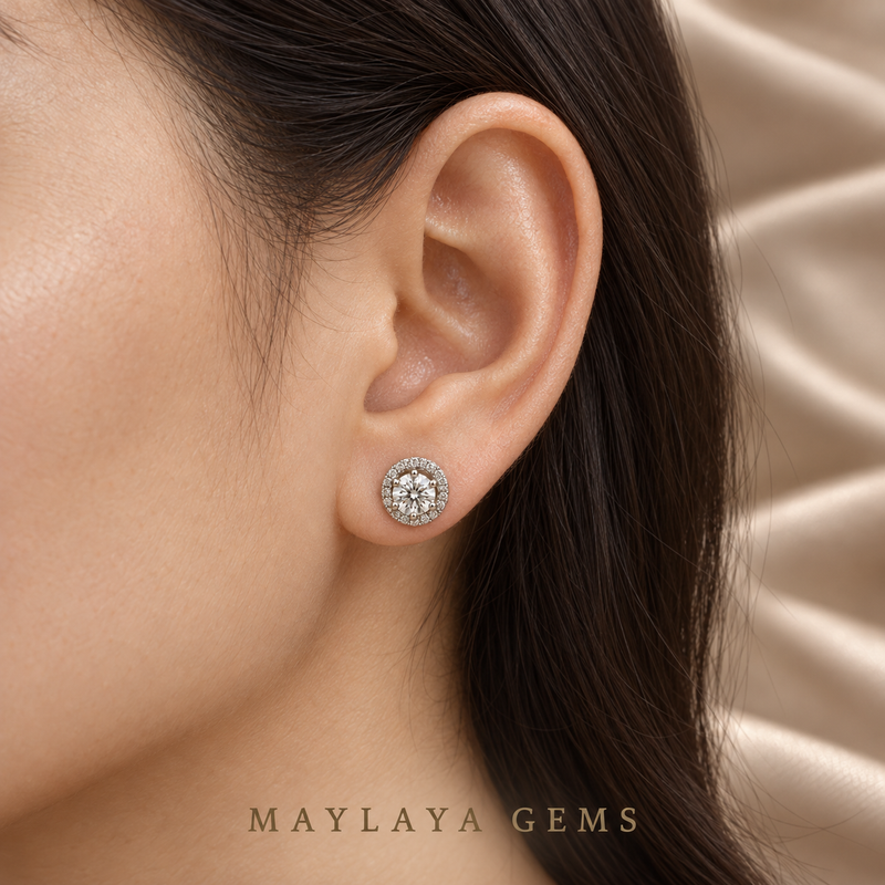 Maylaya Gems MGE1 on-ear illustration, scaled to approximate carat-to-millimetre dimensions; actual fit varies.