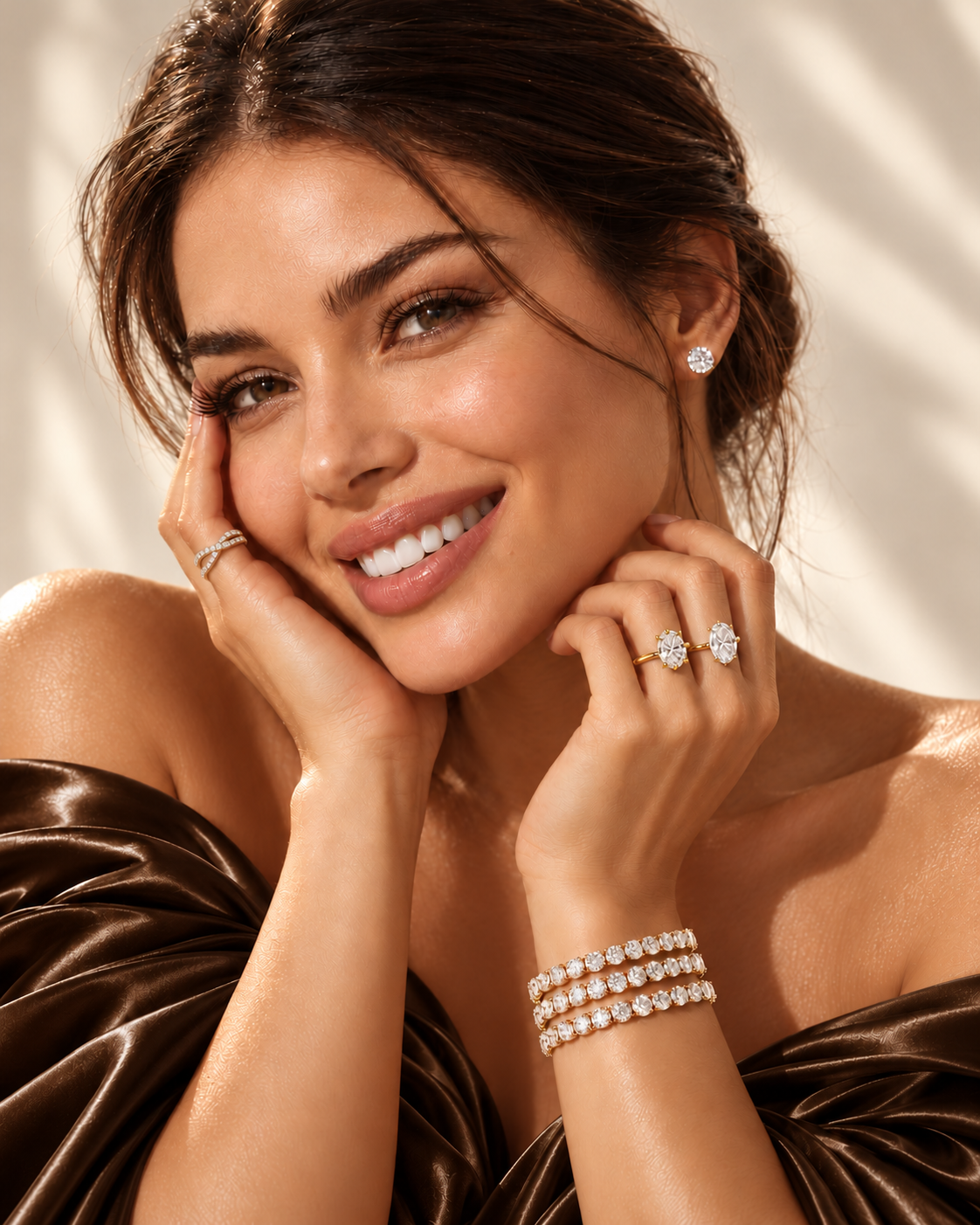 Maylaya model wearing stacked diamond tennis bracelets and diamond stud earrings