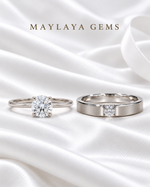 Load image into Gallery viewer, Golden Vows — Maylaya Gems 0.32 ct solitaire and F009 men's ring together on white wedding satin
