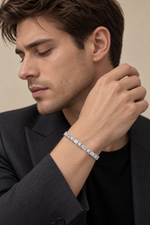 Load image into Gallery viewer, Maylaya Gems 3.93 ct Round &amp; Baguette Lab-Grown Diamond Men's Bracelet — AI-generated young adult male model / ภาพจำลองนายแบบสวมเครื่องประดับด้วย AI
