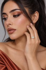 Load image into Gallery viewer, Maylaya Gems 1.7 ct Radiant Emerald Trilogy Lab-Grown Diamond Ring — AI-generated young adult model in eveningwear / ภาพจำลองนางแบบสวมเครื่องประดับด้วย AI
